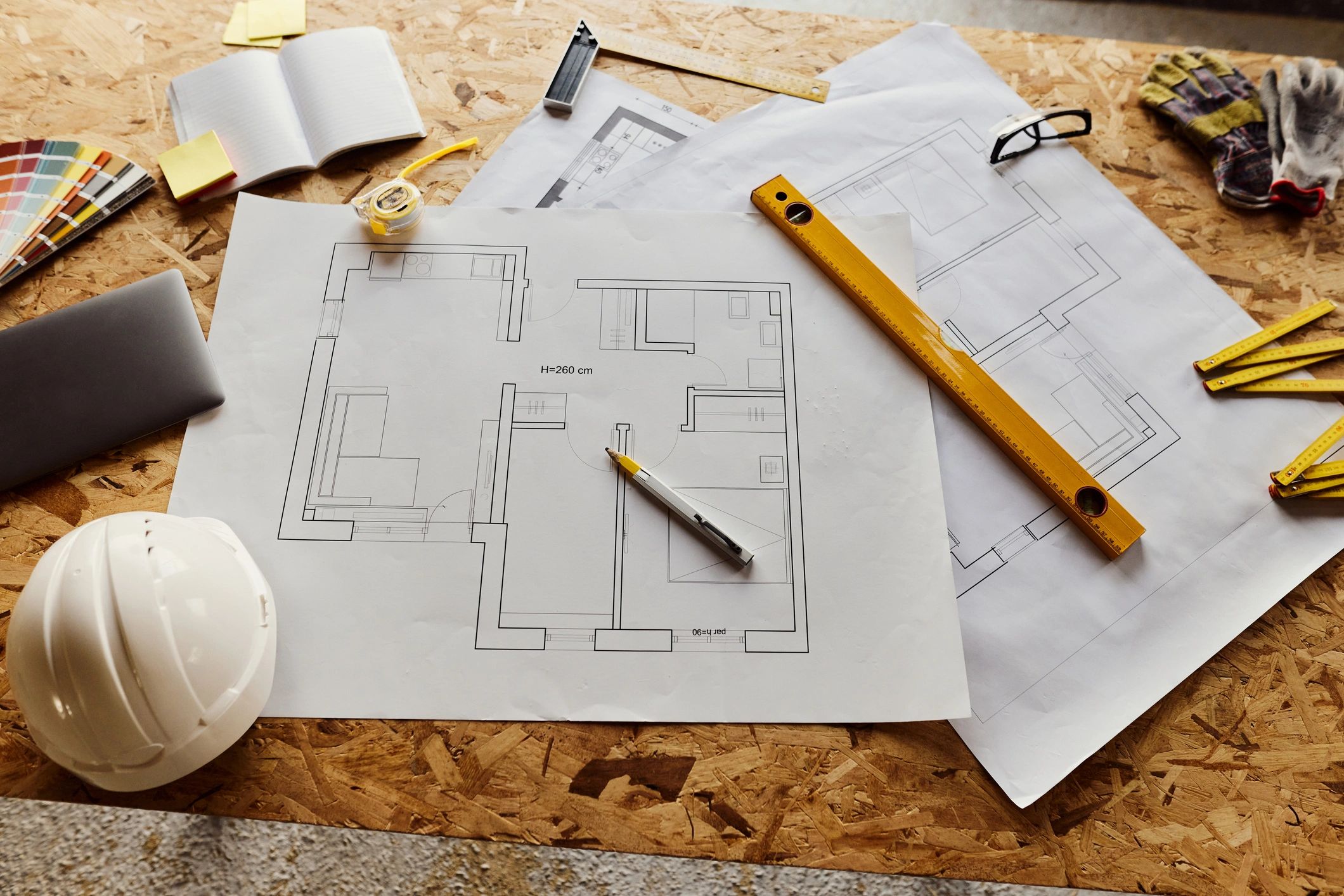 Tools and plans on a work surface